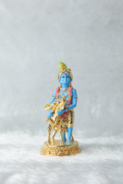 Gold plated Krishna with calf blue Colour